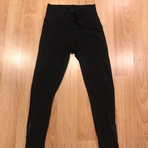 Athleta leggings w/ side pockets & ankle zippers
